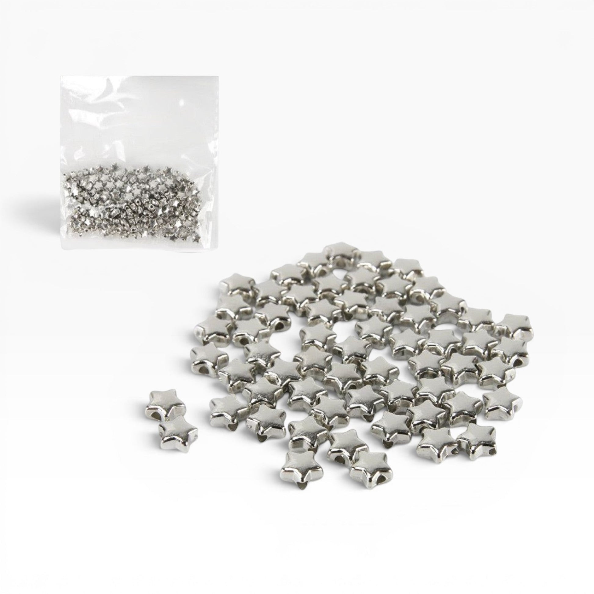 Perline a forma di stella color argento metallizzato di Merceria & Tendenze per creazioni di bigiotteria fai-da-te